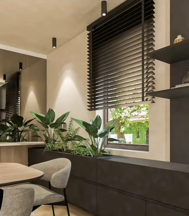 Espace détente avec store à lamelles et plantes
