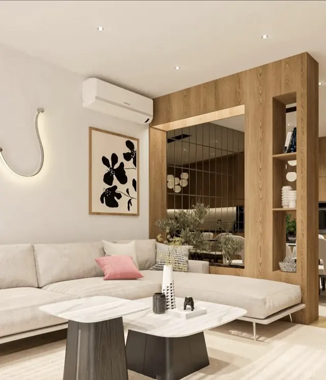 Salon avec claustra en bois et miroirs